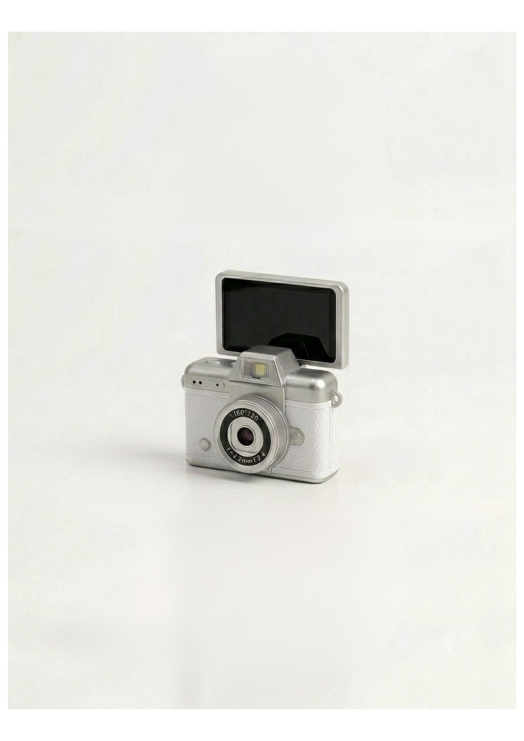 Mini cámara vintage blanca con pantalla abiert