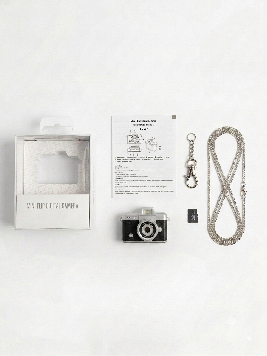Todos los accesorios y elementos incluidos en el paquete de la mini cámara digital vintage negra.