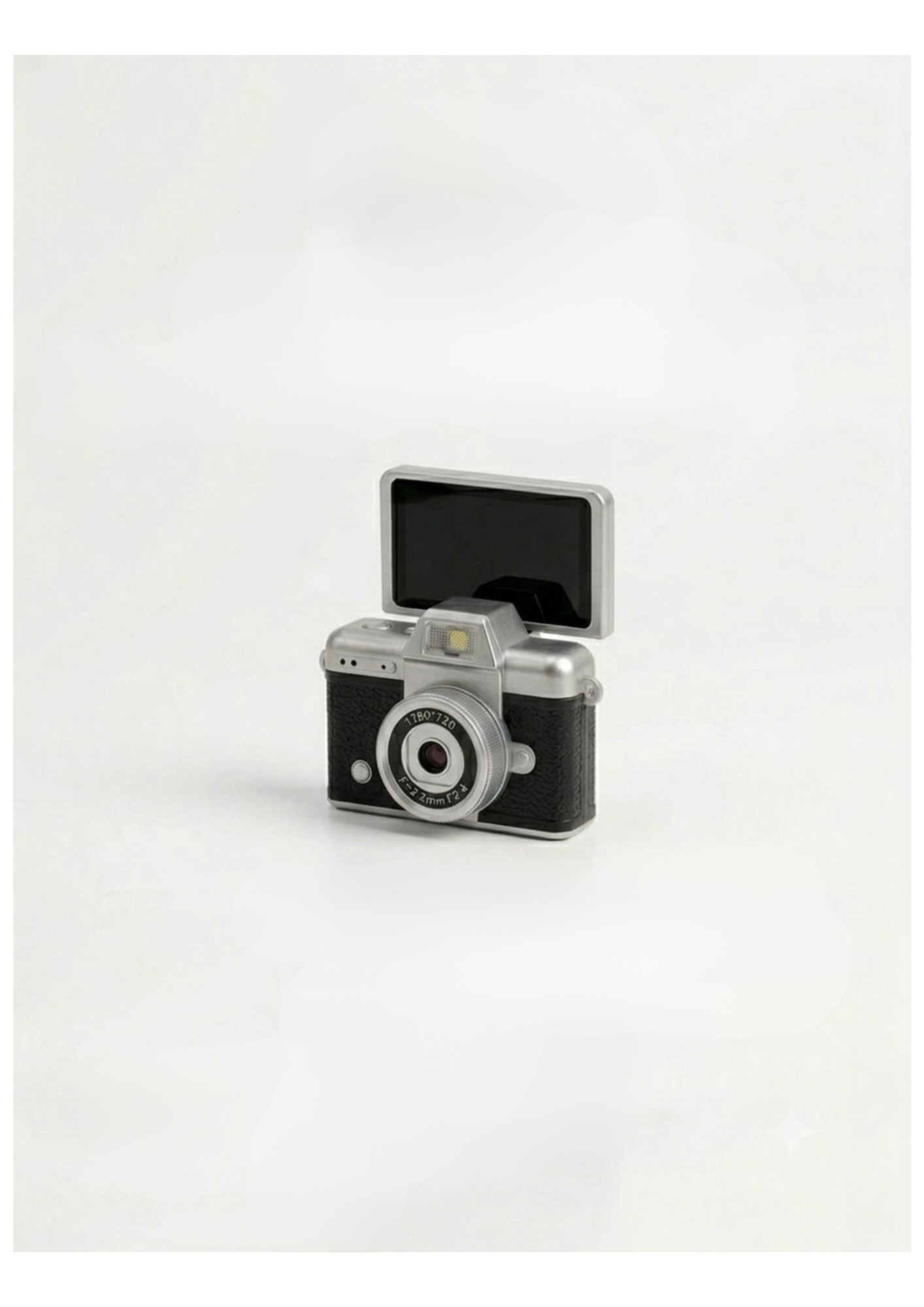 Mini cámara vintage negra con pantalla abierta