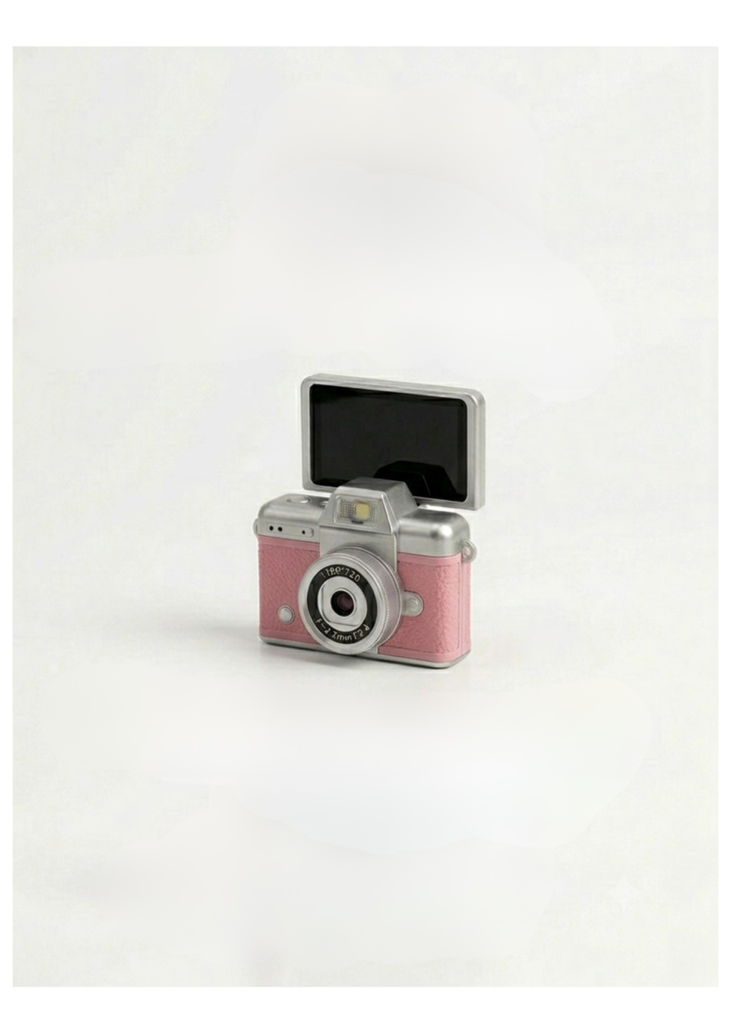 Mini cámara vintage rosa con pantalla abierta