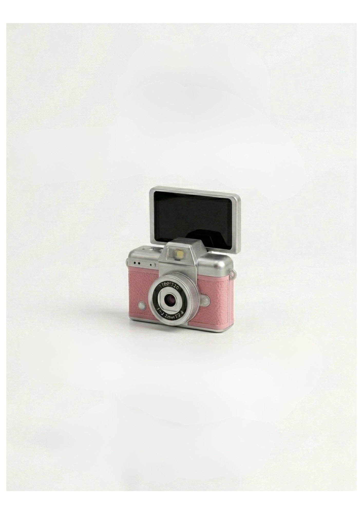 Mini cámara vintage rosa con pantalla abierta